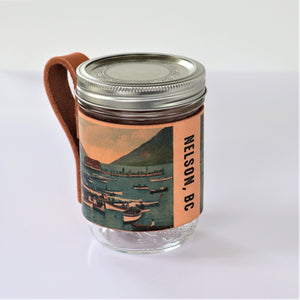Mason jar sleeve with images from the Touchstones Nelson Archive