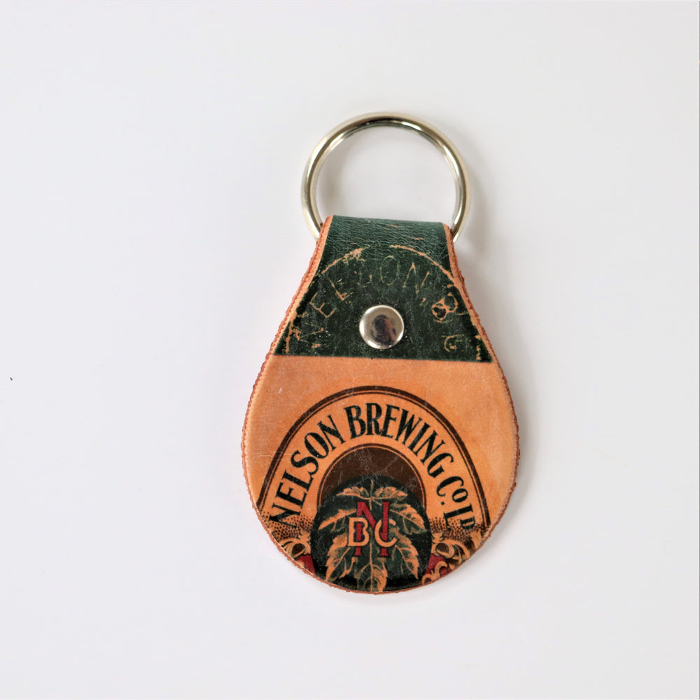 Leather key chain with images from the Touchstones Nelson Archive