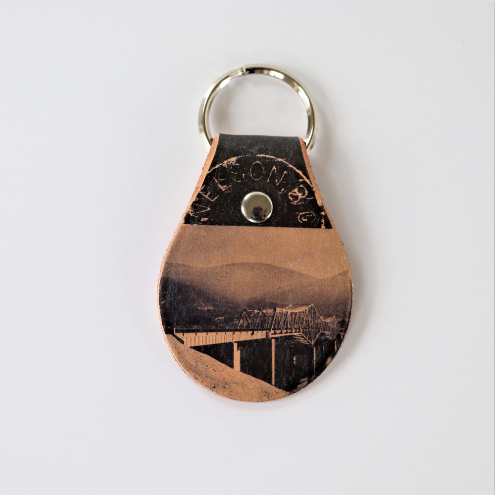 Leather key chain with images from the Touchstones Nelson Archive